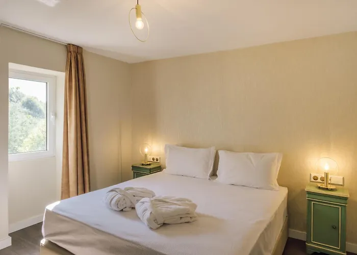 Palacete Do Guerreiro Charme & ホテル オリヴェイラ・ド・オスピタル